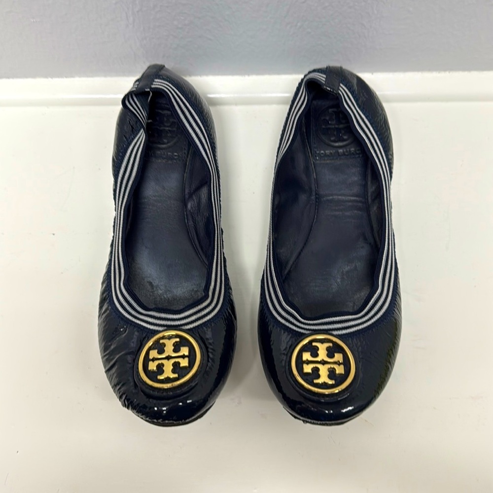Tory Burch Dark Navy Patent Leather with Gold Toe